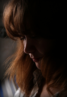 Застенчиво